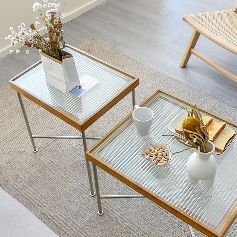 Scandinavian Glass Coffee Table with Wood Accents Cross Legs Cocktail Table