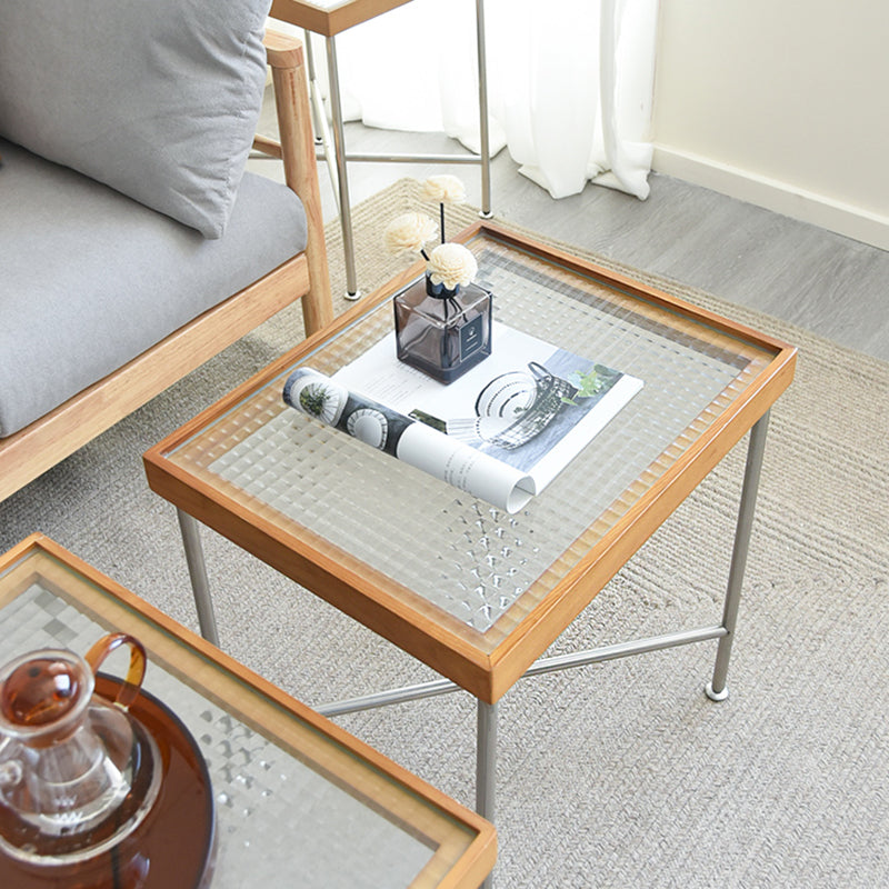 Scandinavian Glass Coffee Table with Wood Accents Cross Legs Cocktail Table