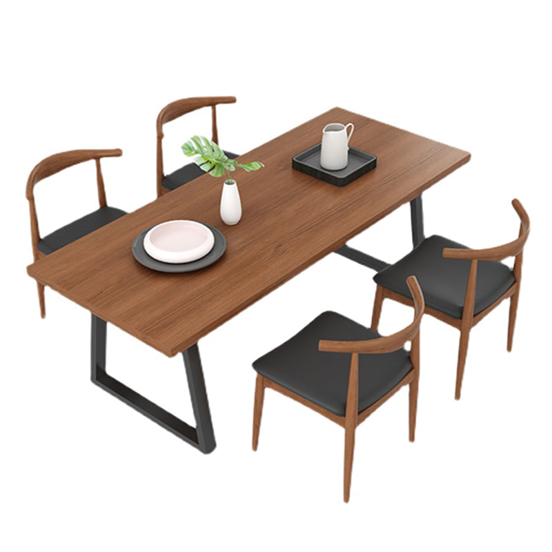 Metal Sled Base Dining Table Modern Solid Wood Top Dining Table in Brown and Black