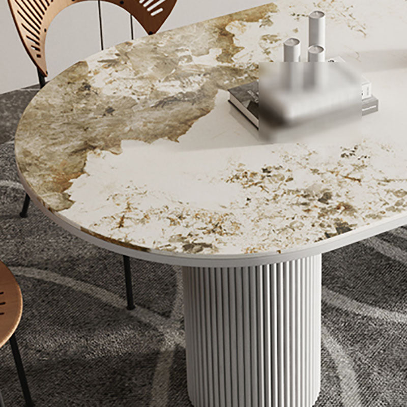 Table de salle à manger ovale moderne avec dessus en pierre et double piédestal en métal