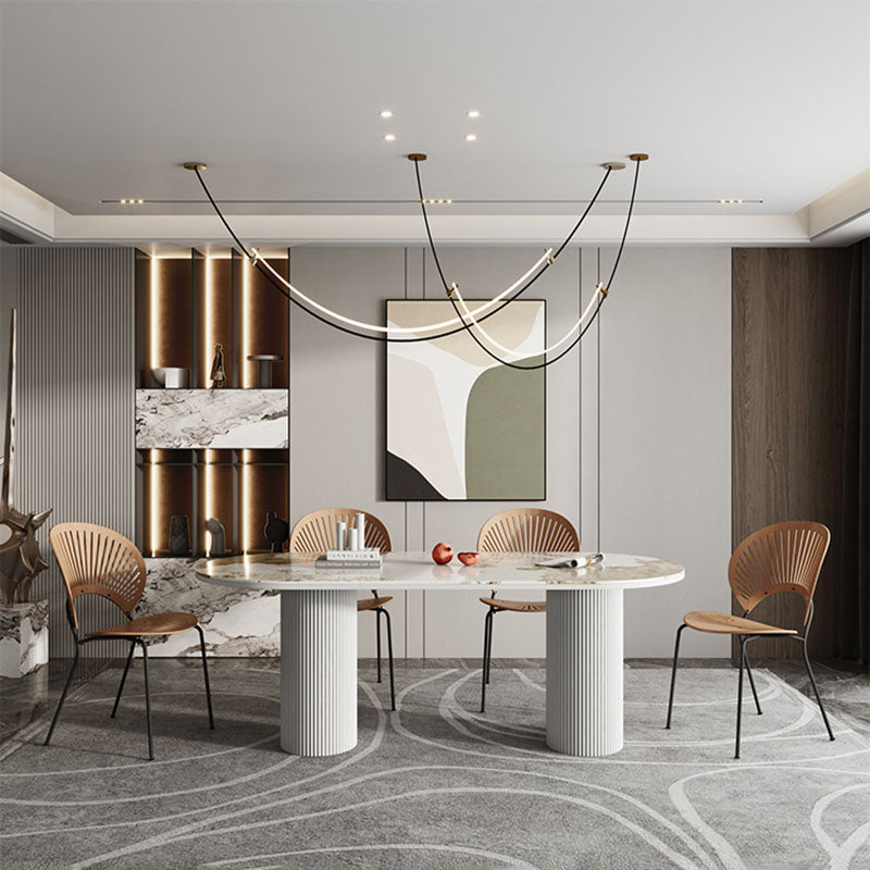 Table de salle à manger ovale moderne avec dessus en pierre et double piédestal en métal