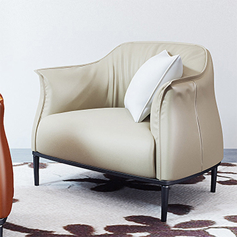 Solid Color Genuine Leather Arms Included with Black Legs Round Arms Barrel Chair