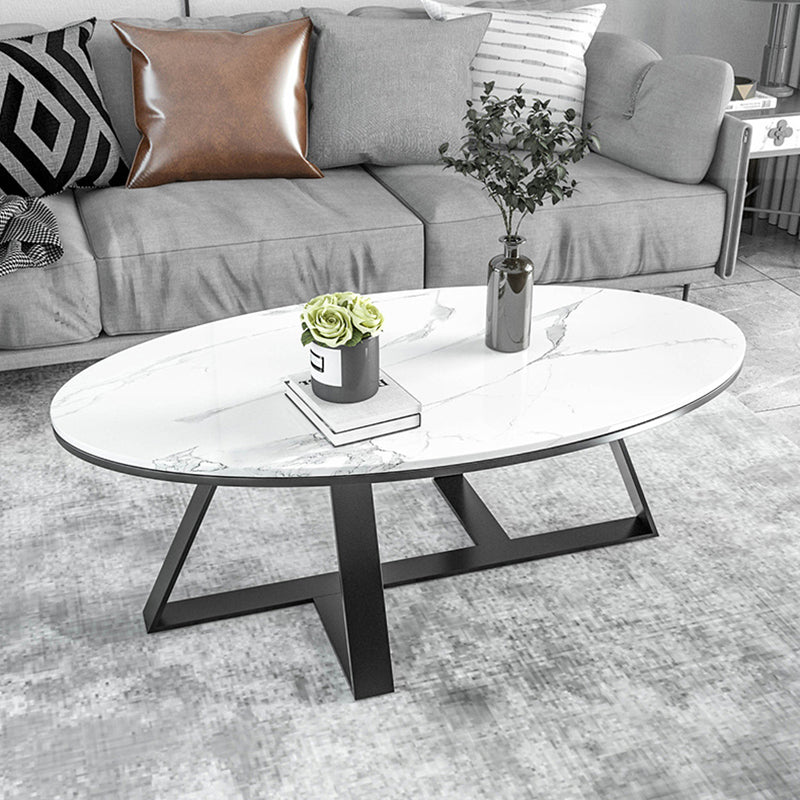 Oval Coffee Table with a Black/gold Base Made of Marble and Wrought Iron