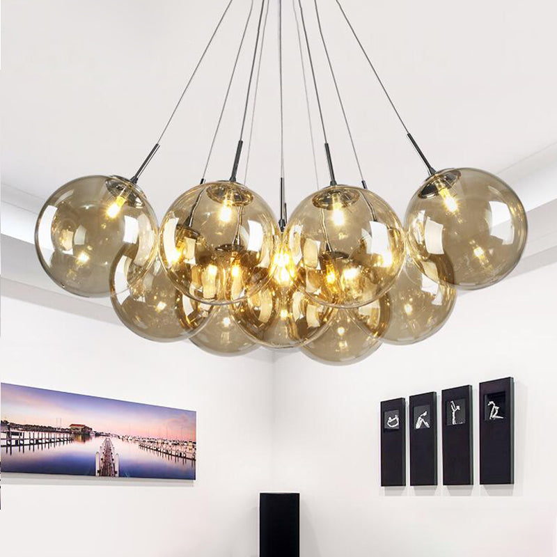 10 lumières Livrés Pendard multiclongé moderne lampe à plafond à LED chromé moderne avec une teinte en verre ambre bulle