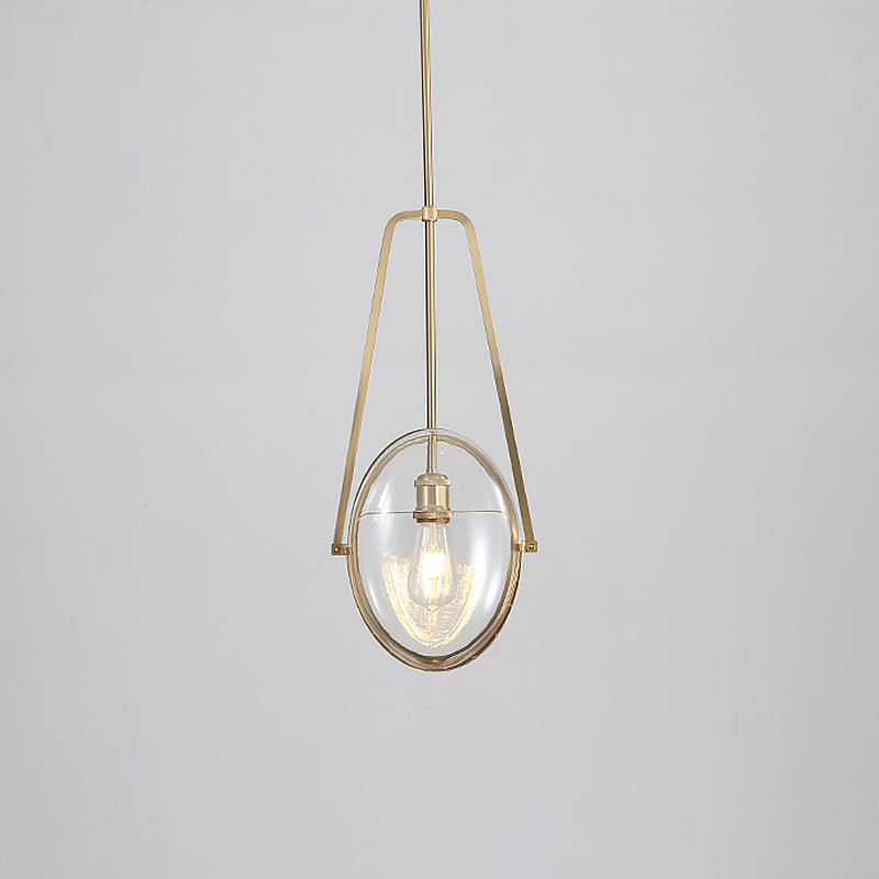 Brass Oval Pendant Light Contemporary 1-Light Clear Glass Ceiling Lamp with Forked Halberd Frame