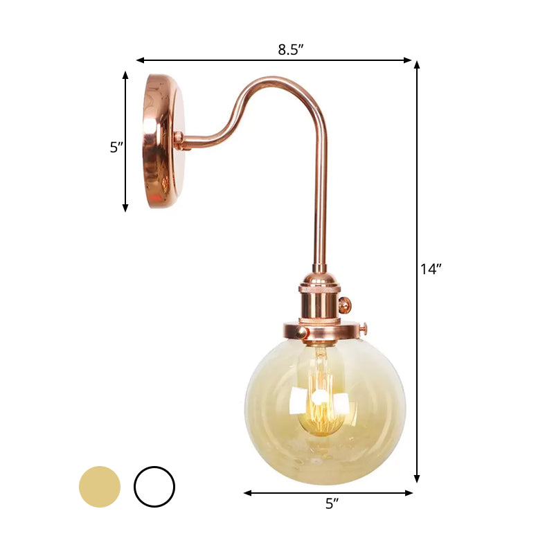 Vintage Globe Wall Lighting 1 Light Clear/Amber Glass Sconce in Copper with Curved Arm