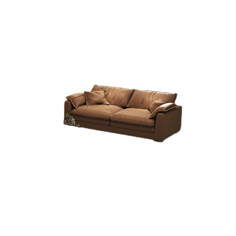 Glam Style Sofa Bed with Sponge Upholstery Filled Orange Faux Leather Sofa