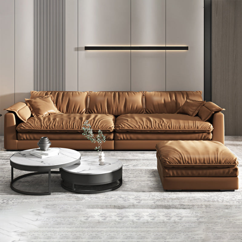 Glam Style Sofa Bed with Sponge Upholstery Filled Orange Faux Leather Sofa