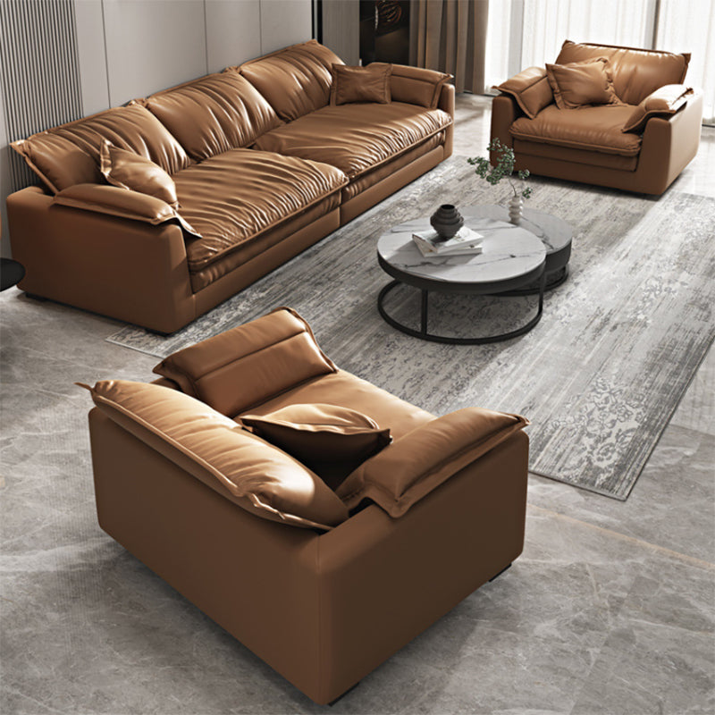 Glam Style Sofa Bed with Sponge Upholstery Filled Orange Faux Leather Sofa