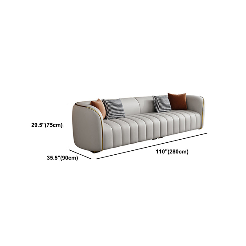 Genuine Leather Sloped Arm Sofa Modern Beige Sofa with Pillows