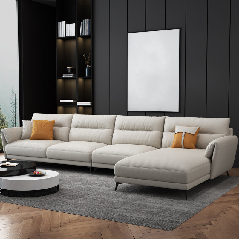 Contemporary 4-Seater Sectional with Pillow Top Arms in Faux Leather