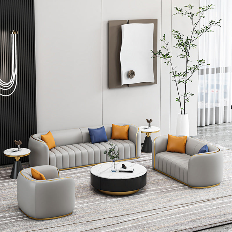 Tuxedo Arm Sofa in Grey/Blue Faux Leather Sofa with Metal Accent
