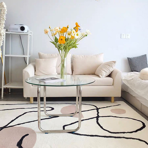 Modern Round Cocktail Table with Glass Top and Steel Sled Base