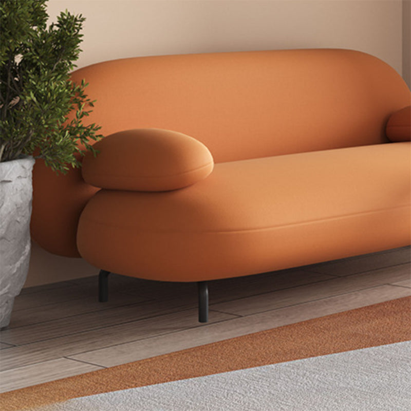 Contemporary 29.5" H Orange Faux Leather Pillow Top Arm Sofa