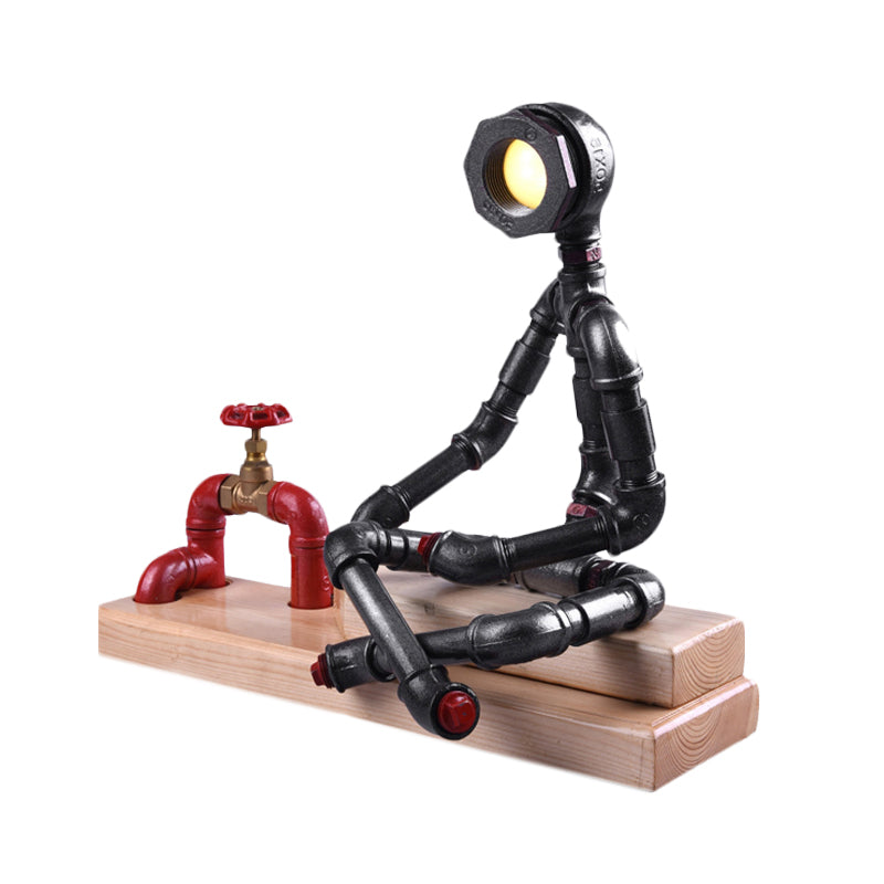 Lámpara de mesa LED Industrial con patas cruzadas de hierro para dormitorio, lámpara de noche en negro con válvula decorativa y base de madera rectangular