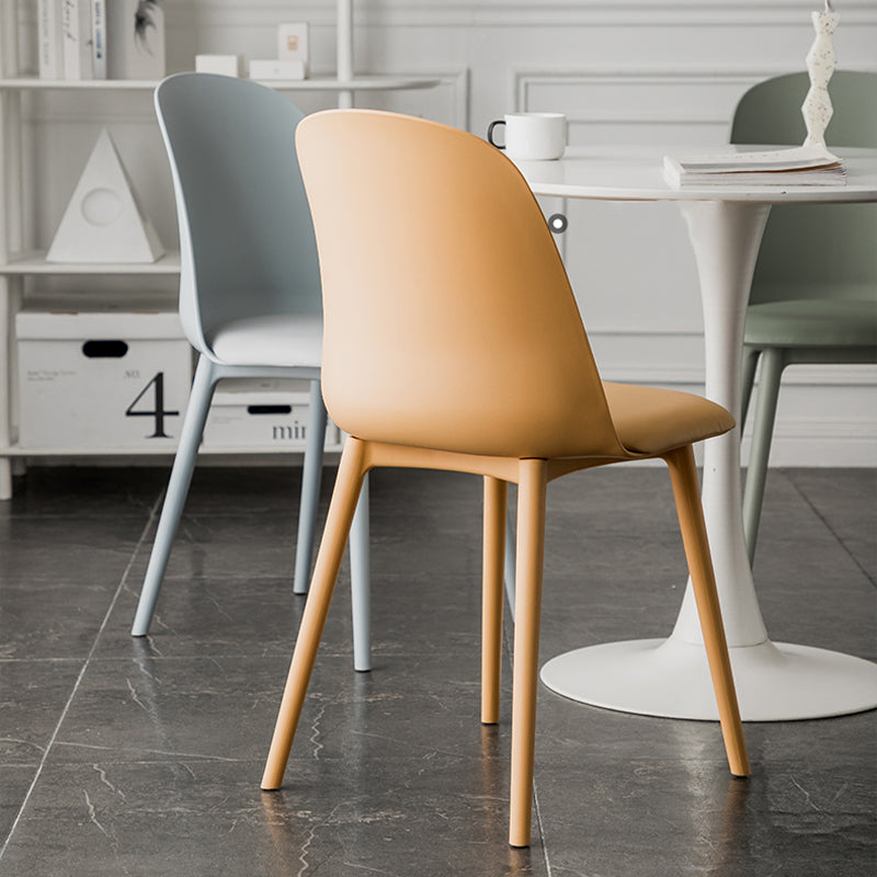 Modern Upholstered Armless Chair Plastic Dining Chair with Metal Base
