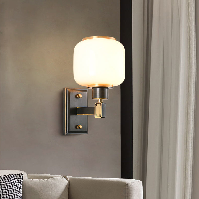 Modern Metal Wall Sconce Lantern Shape Wall Light with Glass Shade for Bedroom