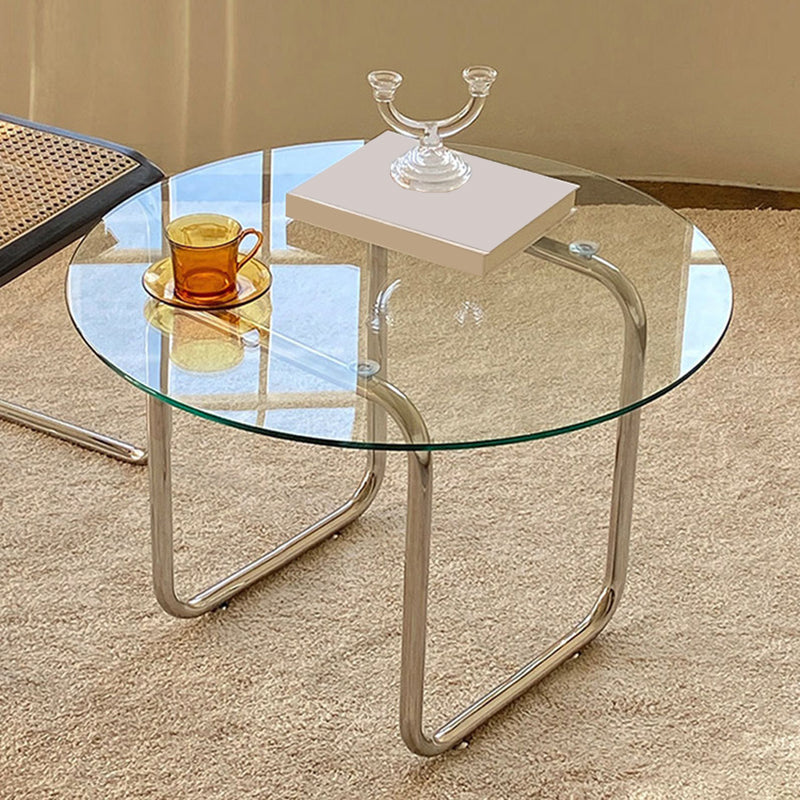 Contemporary Round Glass Top Cocktail Table with Sled Steel Base