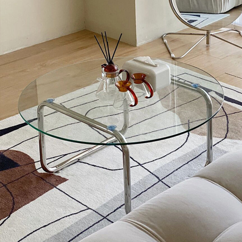 Contemporary Round Glass Top Cocktail Table with Sled Steel Base