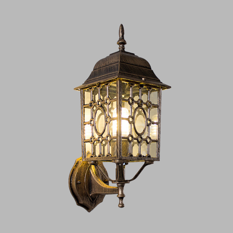 Éclairage mural de grille métallique Country 1 Bulbe Courte Courtard Lampe en rouille avec une teinte en verre transparent cuboïde