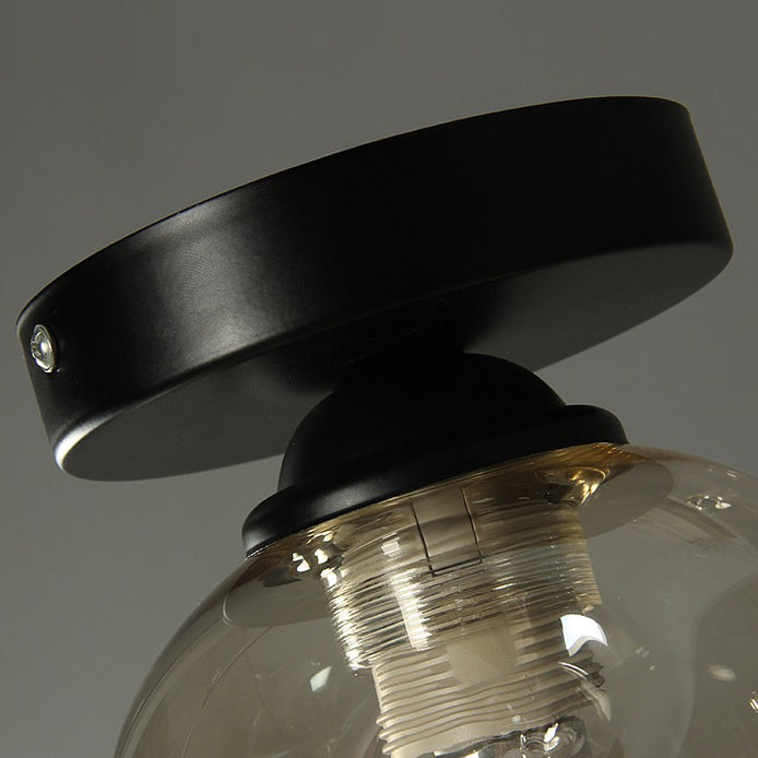 Sphere Shape Flush Light Modern Style Glass 1 Light Flush Ceiling Light in Black / Amber