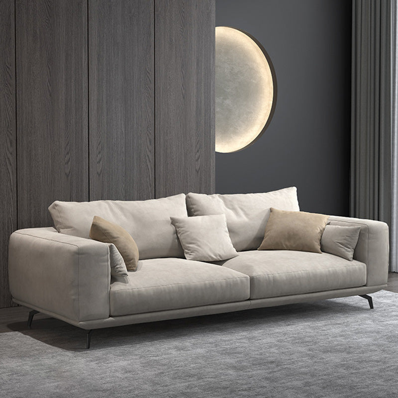 Contemporary Faux Leather Pillows Back Sofa with Tuxedo Arm in Beige