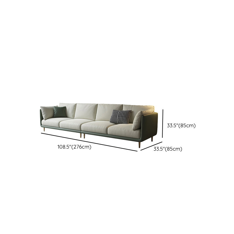 Contemporary Faux Leather Sofa with Pillows Back and Pillow Top Arm