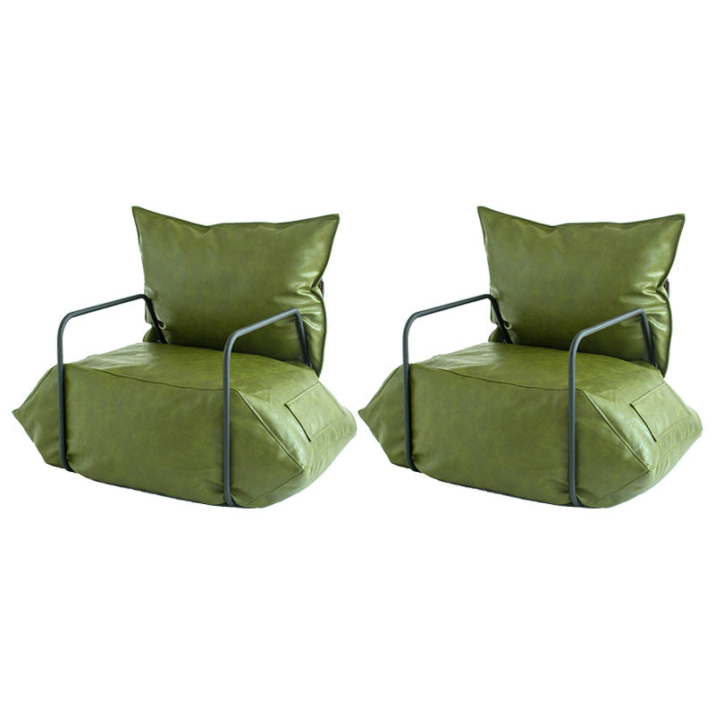 Contemporary Armchair Pillow Back Round Arms with Black Legs Leather Arm Chair