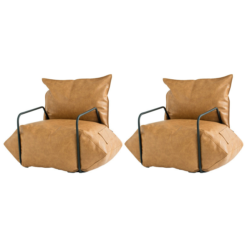 Contemporary Armchair Pillow Back Round Arms with Black Legs Leather Arm Chair