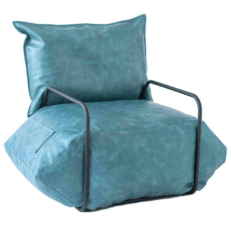 Contemporary Armchair Pillow Back Round Arms with Black Legs Leather Arm Chair