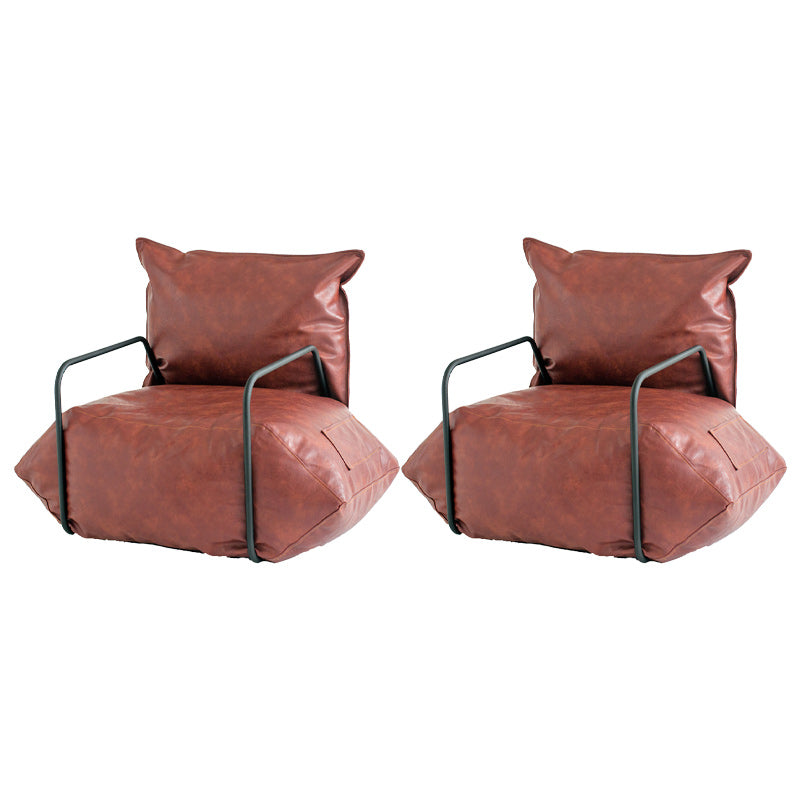 Contemporary Armchair Pillow Back Round Arms with Black Legs Leather Arm Chair