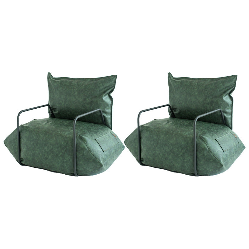 Contemporary Armchair Pillow Back Round Arms with Black Legs Leather Arm Chair