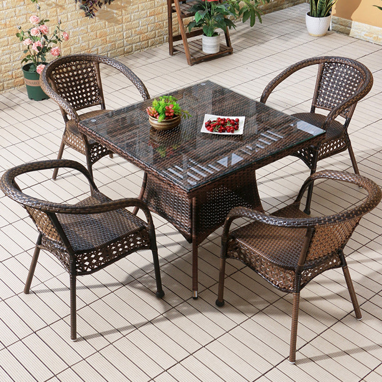 Faux Rattan Patio Dining Side Chair with Steel Base in Brown