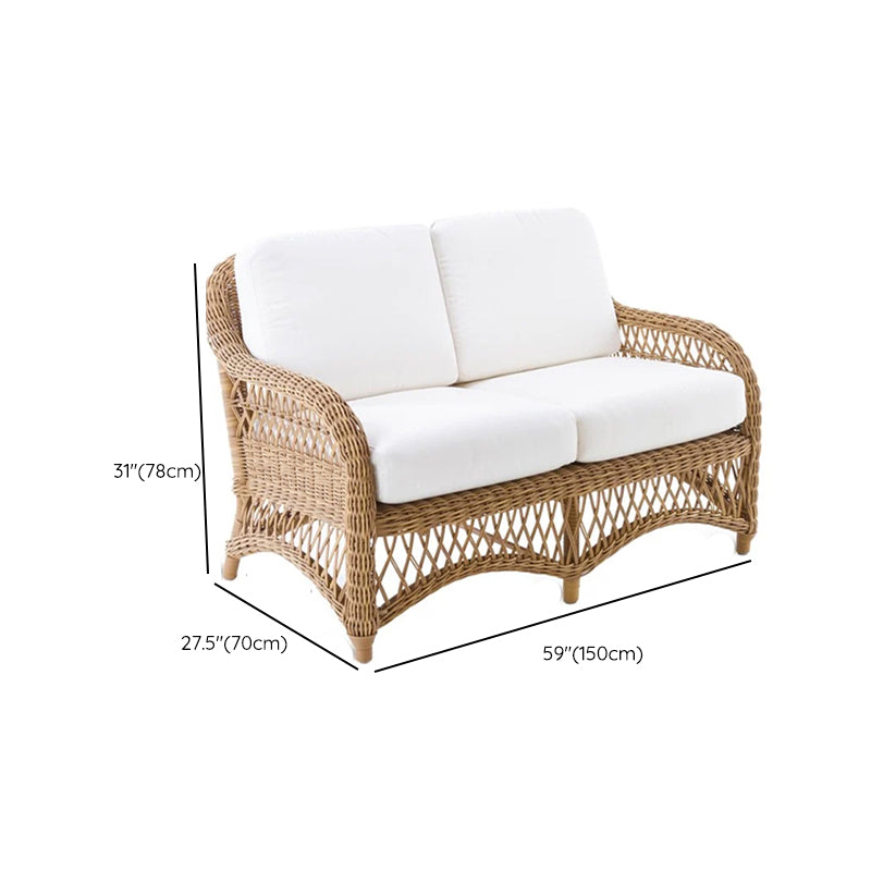 Tropical Outdoor Patio Sofa in Brown Plastic with White Cushion