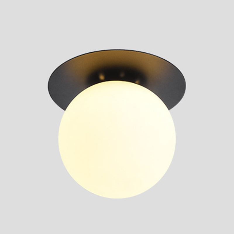 Traditional Globe Bath Sconce Iron & Glass Bathroom Vanity Lighting in Black / Gold