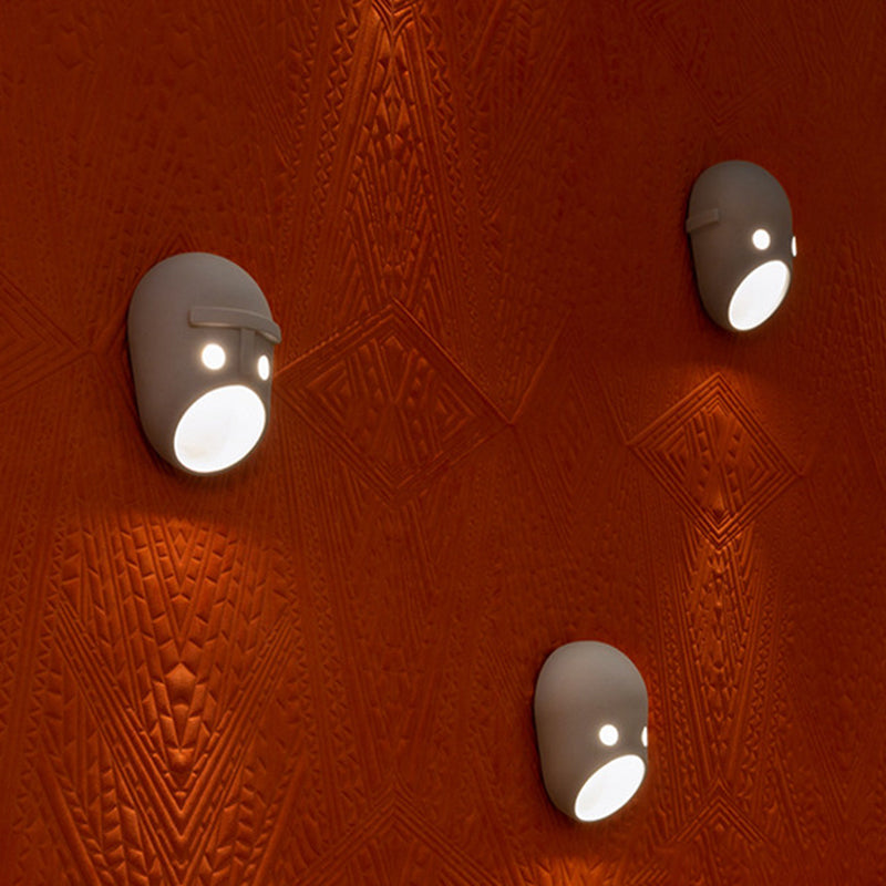 Modern Metal Wall Sconce Mask Shape Wall Light with Resin Shade for Living Room