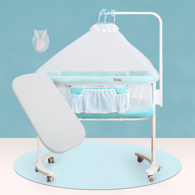 Modern Rocking Crib Cradle Metal Oval Bedside Bassinet with 4 Wheels