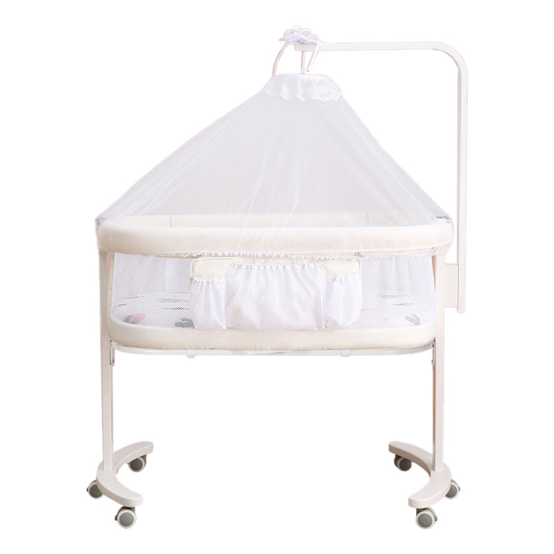 Modern Rocking Crib Cradle Metal Oval Bedside Bassinet with 4 Wheels