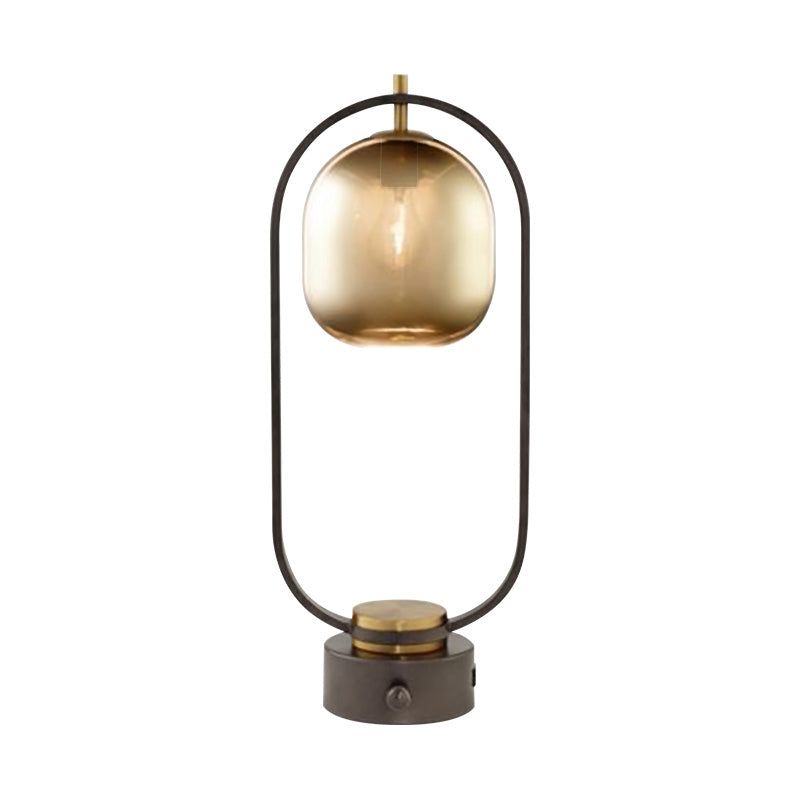 Luz de mesa de noche de metal con anillo ovalado, lámpara LED negra moderna de 1 cabezal con pantalla de cristal ámbar