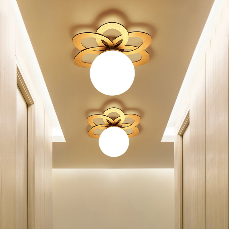 White Frosted Glass Orb Flush Light Modern 1 Light Flush Ceiling Lamp with Gold Flower Canopy