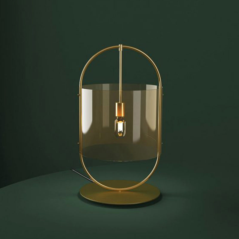 Lampada da comodino in vetro marrone chiaro a 1 testa con illuminazione da scrivania a cilindro dorato e anello ovale