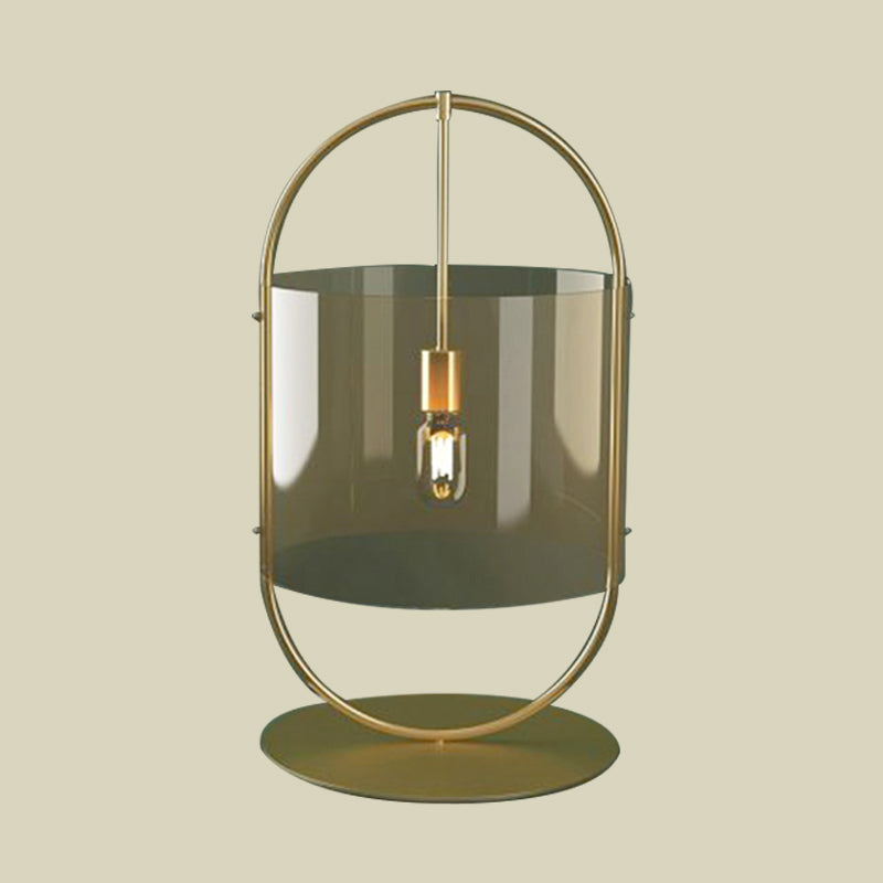 Lampada da comodino in vetro marrone chiaro a 1 testa con illuminazione da scrivania a cilindro dorato e anello ovale