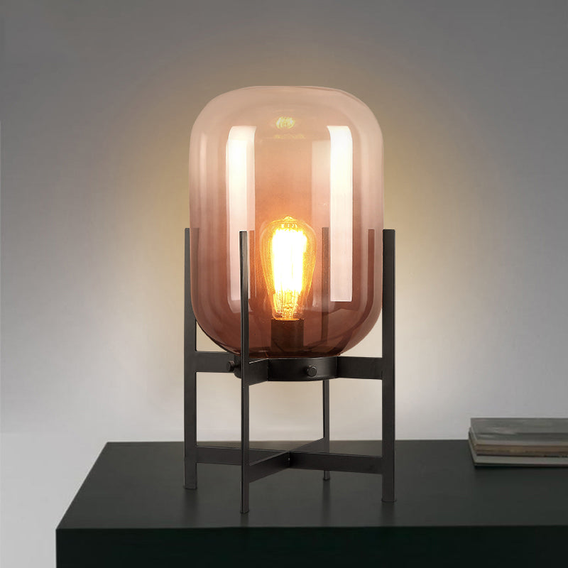 Minimalist Quadruped Night Light Metal 1-Head Living Room Table Lamp in White/Black with Oval Tan Glass Shade