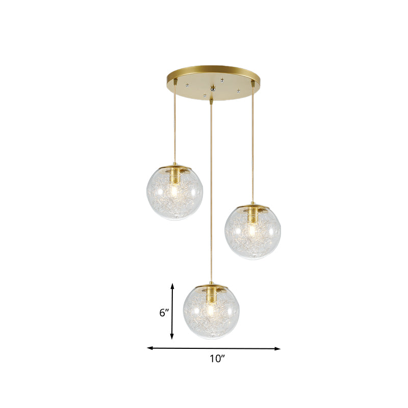 Minimalist Pumpkin Ball Multi Light Pendant Clear Glass 3 Lights Coffee House Hanging Lamp in Gold with Metal Line Deco Inside