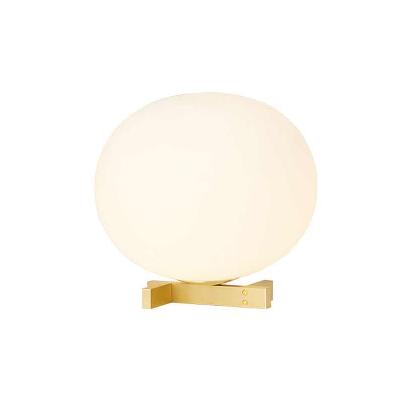 Lampada da notte postmoderna a forma di uovo in vetro color crema Lampada da comodino con finitura oro a 1 luce per comodino