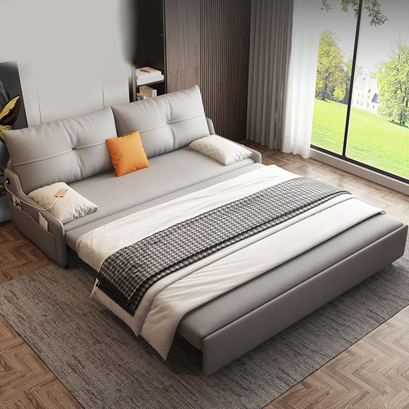 Glam Grey Futon Sleeper Sofa with Tufted Back and Storage in Faux Leather