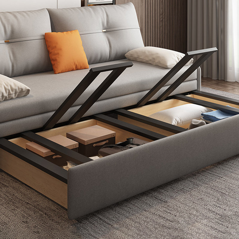 Glam Grey Futon Sleeper Sofa with Tufted Back and Storage in Faux Leather