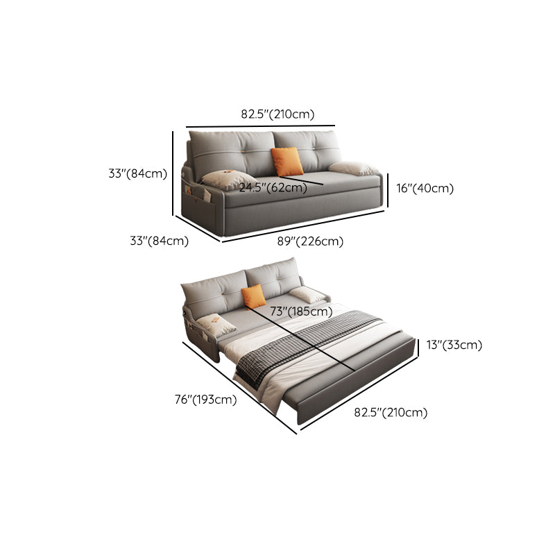 Glam Grey Futon Sleeper Sofa with Tufted Back and Storage in Faux Leather