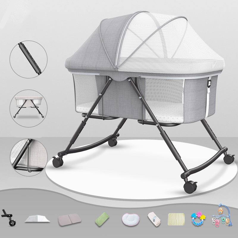 Modern Plastic Color Matching Oval Nursery Crib with Casters