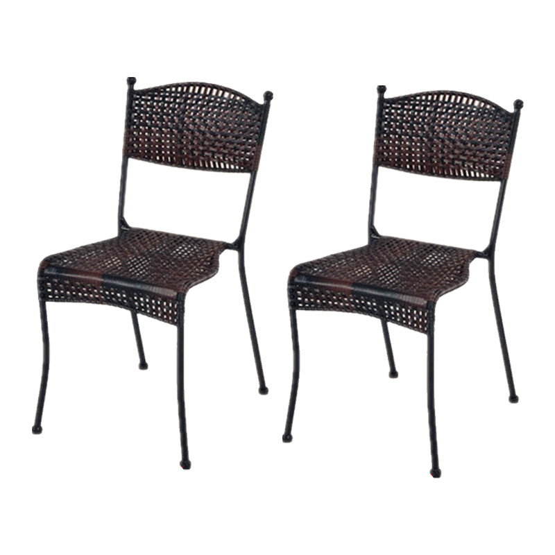 Tropical Dining Side Chair in Brown/Black Plastic with Open Back